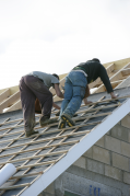 Man preparing roof for work